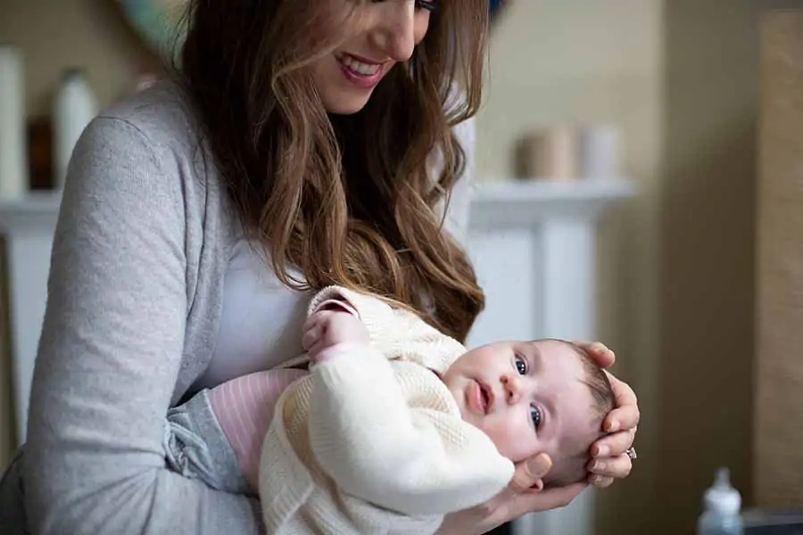 Melissa holding her daughter